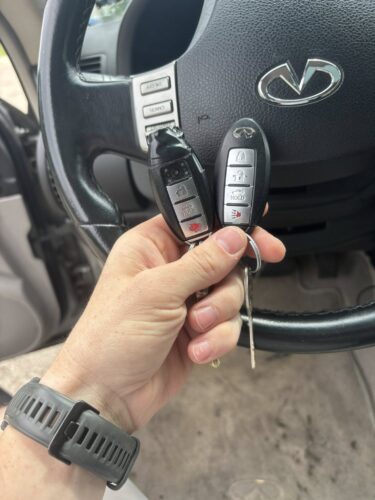 Man with new keys from a car key locksmith in Sharon, WI
