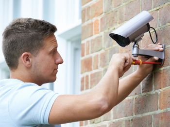 Specialist Performing a Surveillance Camera Installation in McHenry, IL